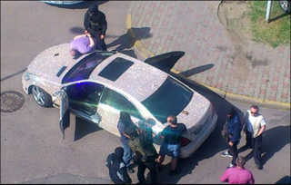 Illustration for article titled How not to hide in plain sight: Â Drive a jewel encrusted Mercedes.